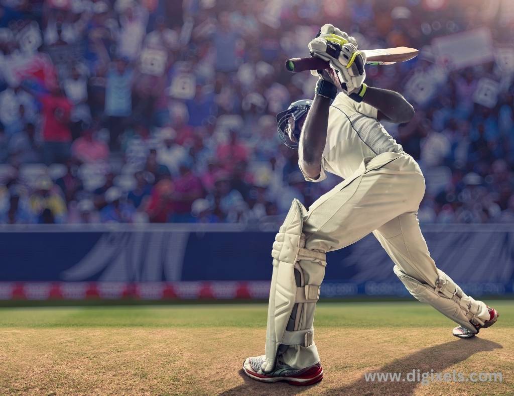 Cricket images of batsman in white holding bat diving right down side.