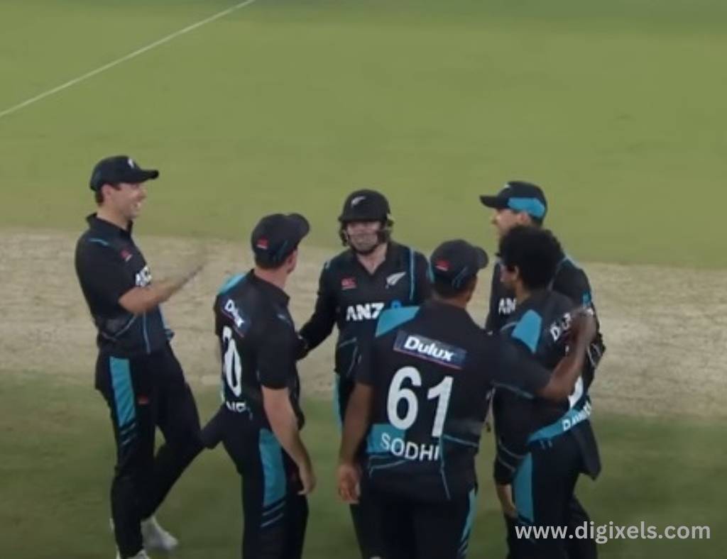 Cricket images of New Zealand players celebrating, gathering together