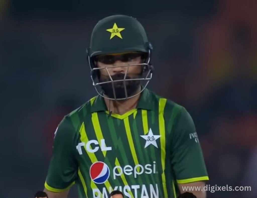 Cricket images of Pakistan batsman going back to pavilion, with helmet, uniform