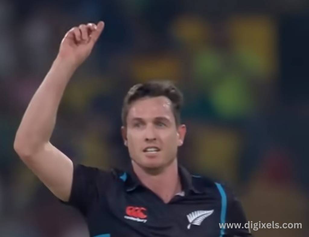 Cricket images of New Zealand baller, lifting hand