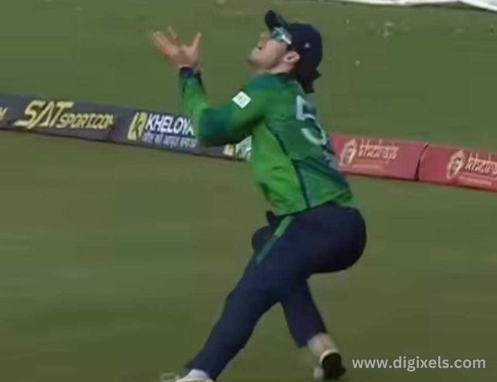 Cricket images of Ireland fielder catching ball