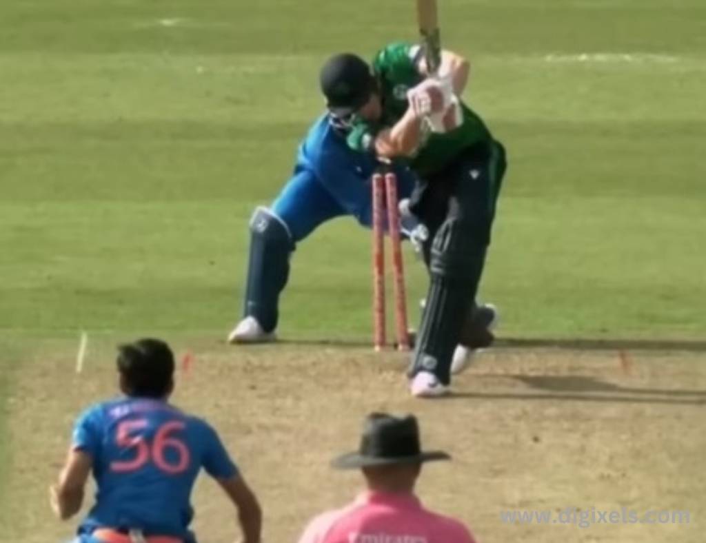 Cricket images of Ireland batsman batting, India bowler bowling, ball hit the wicket.