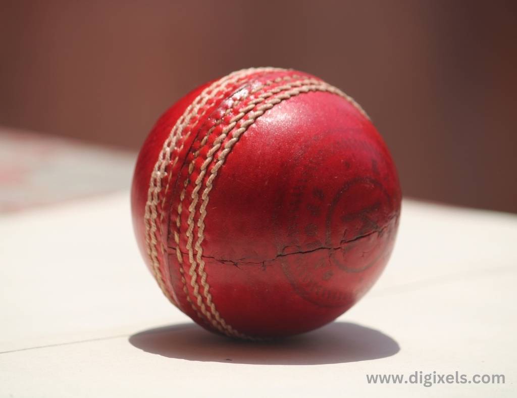 Cricket images of cricket ball, red ball, big ball.